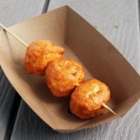 Fried Shrimp Balls (3) · Deep fried shrimp balls on a skewer and served with a side of Hunny Beez Sauce.
