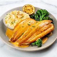 Petrale Sole · pan seared, brandy cream sauce, crab mashed potatoes, grilled broccolini, grilled lemon