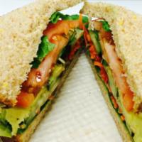Rouge Sandwich · house roasted  sweet red pepper, sun-dried tomato ,organic baby spinach ,lettuce paired with...