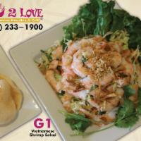 G1. Vietnamese Shrimp Salad · Goi tom viet nam. Steamed shrimp tossed with shredded cabbage, pickled carrots, and special ...