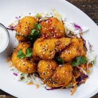 Spicy Cauliflower Dippers · Fried, panko-crusted cauliflower dippers with your choice of Buffalo, hot honee, or Thai chi...