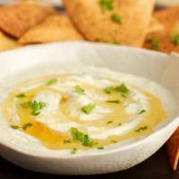 Whipped Feta Appetizer · Our scratch-made feta dip,
topped with honey and fresh parsley 