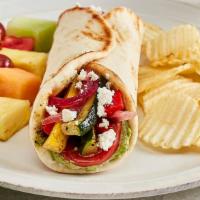 Grilled Veggie Gyro · Pesto aioli, tomatoes, zucchini, squash, grilled red peppers, grilled onion, and feta. Veget...