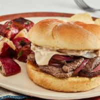 Grilled Beef Sandwich · Grilled onions, melted Swiss, and horseradish sauce on a kaiser bun.