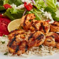 Grilled Shrimp Feast · Seasoned and grilled with lemon juice, butter, and just a touch of blackened seasoning. Glut...