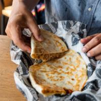 Cheese Quesadilla · Mix of feta, Asiago and Muenster cheese. Add tomato for an additional charge.