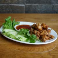 Garlic Frog · House special dish, a fried frog with a rich flavor of garlic with hot sauce.