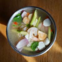 Seafood Poh - Tak  Soup · Traditional medium spicy and sour soup with assorted seafood, lemongrass, basil, and kaffir ...
