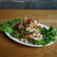 Grilled Shrimp Salad · Grilled prawns with chili, vegetables, lemongrass, sweet chili paste in lime-based dressing.