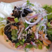 Silver Noodles Salad · Silver noodles, ground pork, tiny sun-dried shrimp, peanut with fresh Thai chili mixed in li...