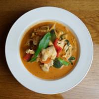 Red Curry · Mild-medium Red curry with Thai eggplant, bamboo shoot, bell peppers, kaffir lime leaves.