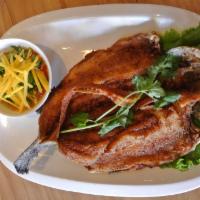 Trout with Mango Sauce  · Fried quick marinated whole trout in fish sauce and light white pepper powder, Served with m...