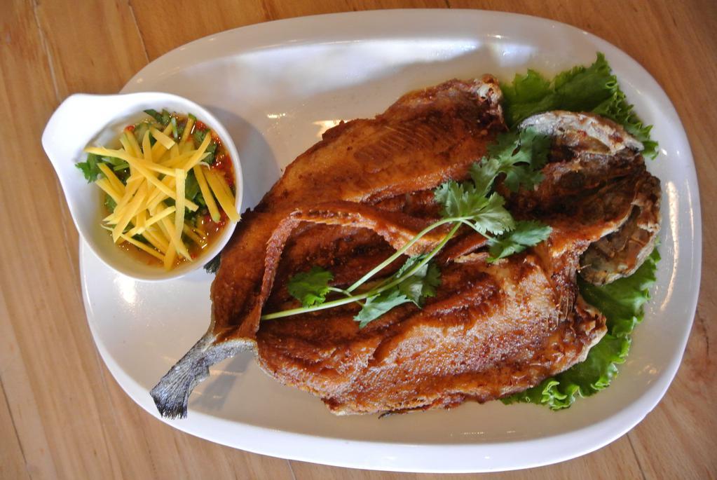 Trout with Mango Sauce  · Fried quick marinated whole trout in fish sauce and light white pepper powder, Served with mango sauce. Whole fish; Bone in. 
