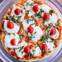 Margherita Pizza · Mozzarella, tomatoes and fresh basil.