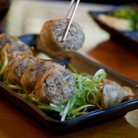 DAECHANG SUNDAE · Stuffed large intestine with seasoned beef, pork, onion, glass noodles, tofu, cabbage and ch...