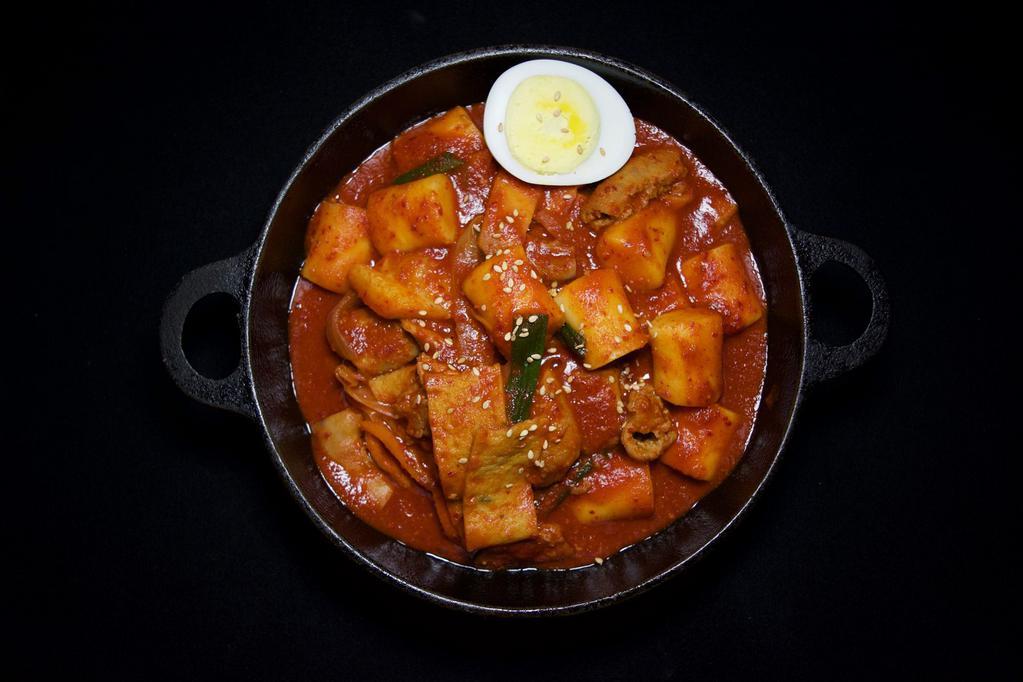 FIRE TTEOK-BOKKI · Spicy flour cakes with cabbage, scallion, carrot, and small intestine.(very spicy)