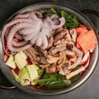 NAKGOP JOENGOL · Beef small intestine, large intestine, tripe, vegetables and octopus in our house special br...