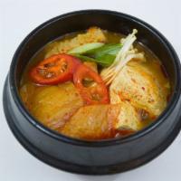 KIMCHI JJIGAE · Kimchi stew with pork, tofu and vegetables. (spicy)
