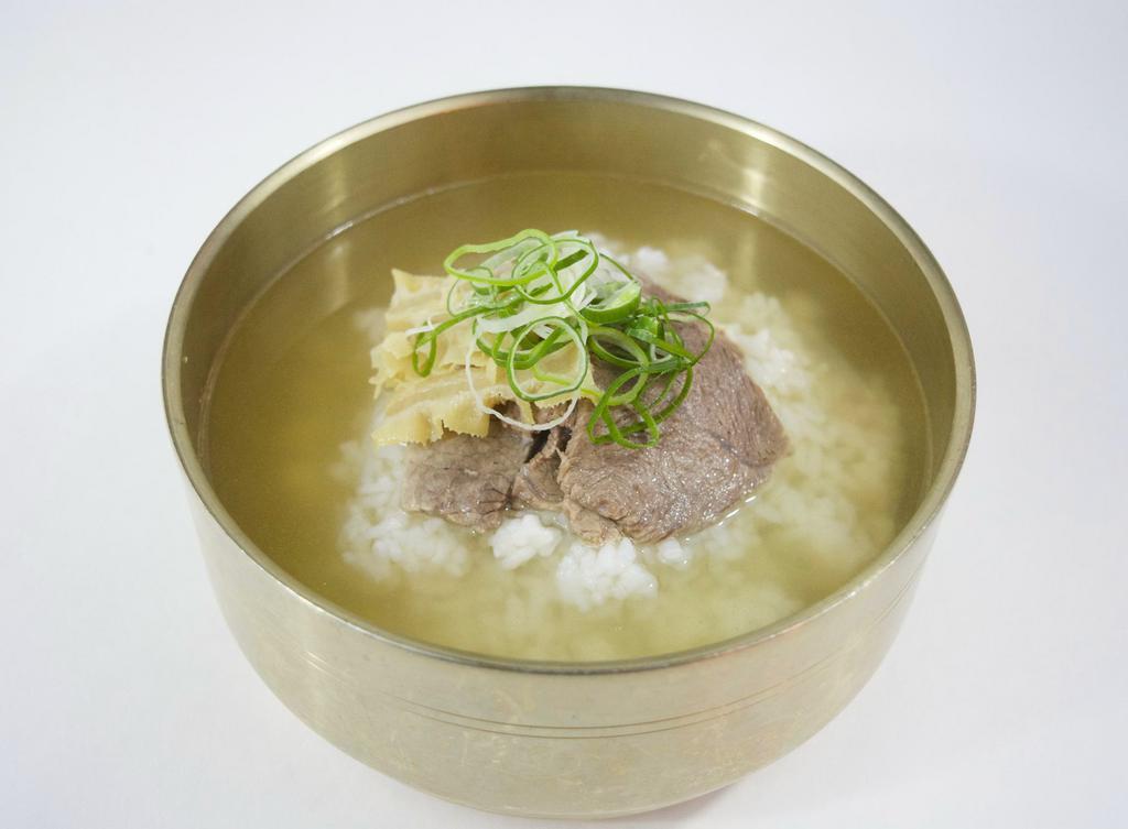 GOM TANG · Long simmered bone stew with tripe, brisket and rice.