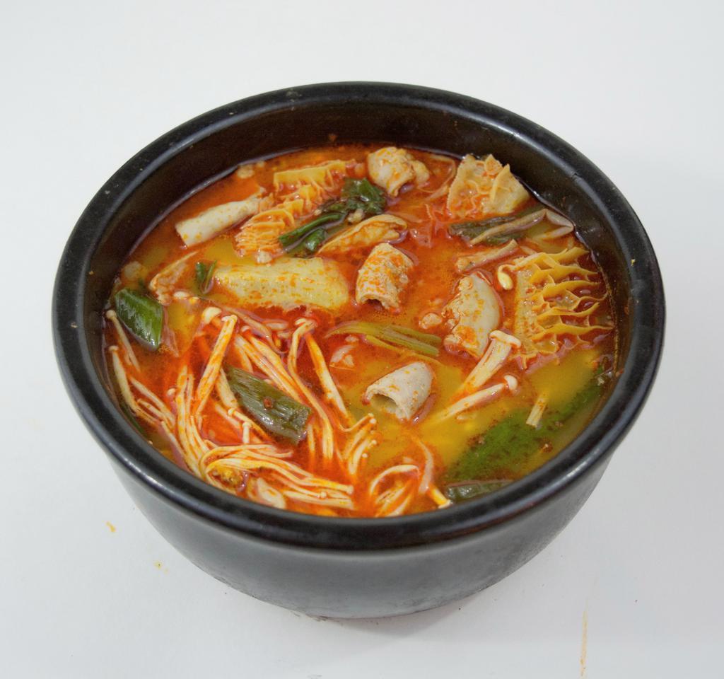 GOP TUK BAE GI · Intestines stew with vegetables in a stone pot. (spicy)