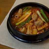 TUK NAE JANG TANG · Tripe and intestines stew with vegetables in a stone pot. (spicy)