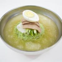 MUL NAENG MYEON · Buckwheat noodles with thinly sliced brisket and boiled egg in a cold broth.