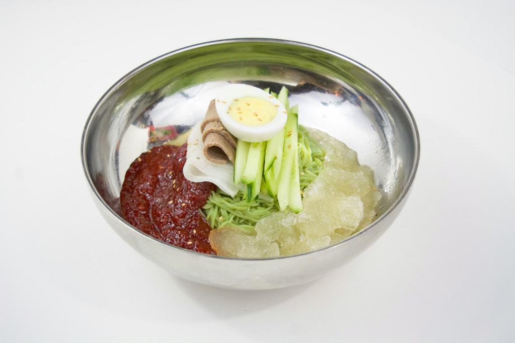 BIBIM NAENG MYOEN · Buckwheat noodles with thinly sliced brisket and boiled egg in a house special spicy sauce. (spicy)