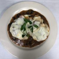 Chicken Valdostana · Breast of chicken topped with prosciutto and provolone in a mushroom white wine sauce. Serve...