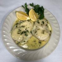Pollo Principessa · Egg-dipped breast of chicken sauteed in a lemon wine sauce. Topped with melted mozzarella an...