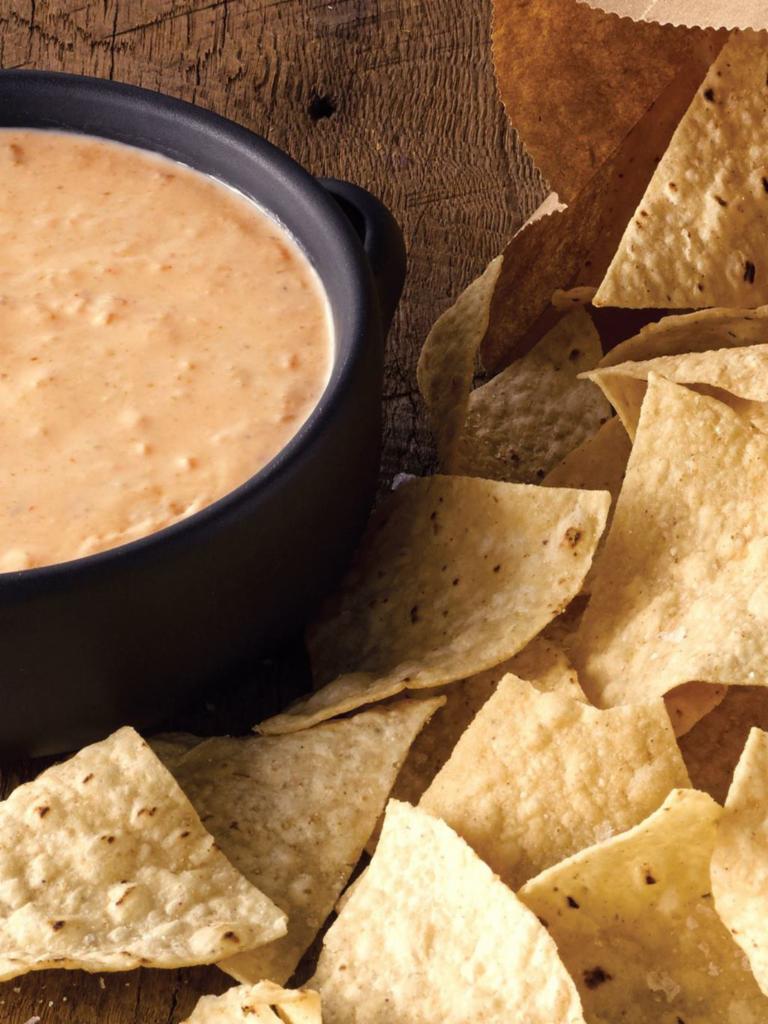 Chips & Queso Diablo · Spice level 3/4. Our signature spicy Queso Diablo, served with freshly fried in-house tortilla chips. [Cal 940]