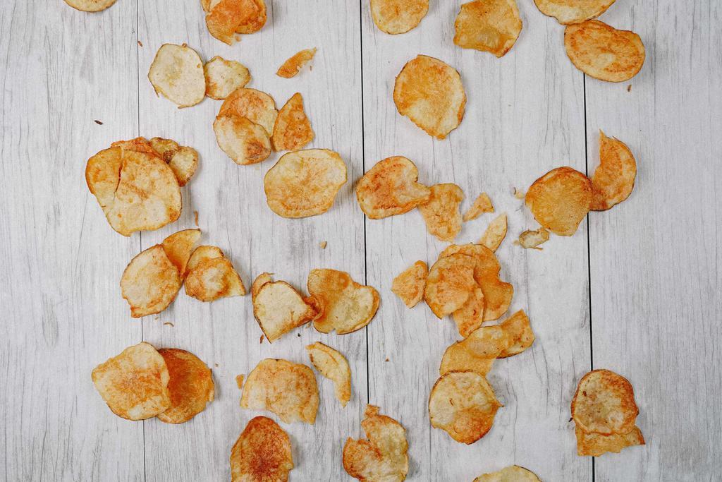 Papas · 6.5 oz Home Made Crunchy Potato Chips.