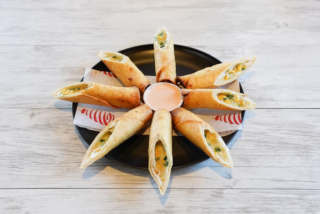 Flautas · Four Crispy Flour Tortillas Wrapped with Green Peppers, Corn, Choice of Chicken or Cheese and a Side of Salsa Crema.