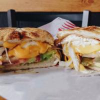 Suiza Torta · A Mexican Style Sandwich with Mayo, Avocado, Tomato, Pickled Jalapenos, Ham, American Cheese...