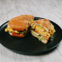 Torta de Huevo · A Mexican Style Sandwich with Mayo, Avocado, Tomato, Pickled Jalapenos, Scrambled Eggs and c...