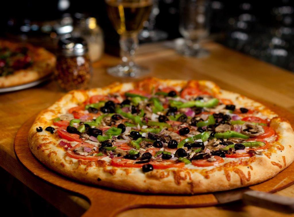 Hurricane · Mushroom, green pepper, red onion, tomato and black olive.