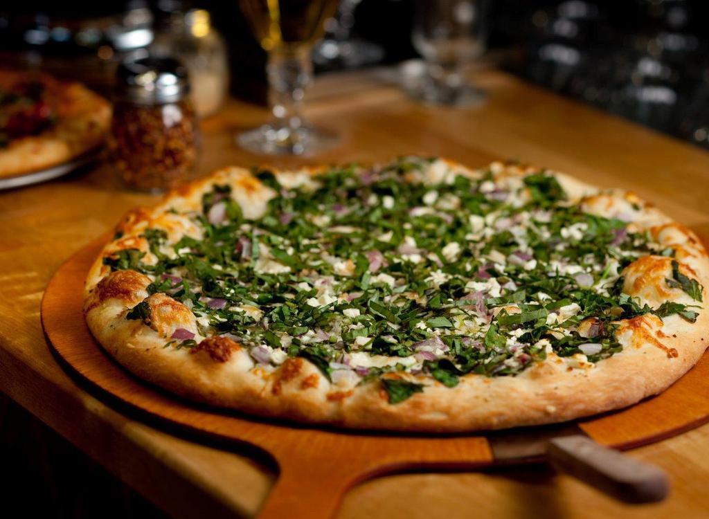 Howser · Spinach, red onion, feta, fresh garlic, Parmesan and fresh basil.