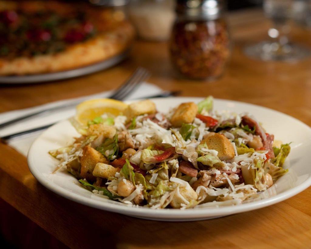 Chop Salad · Romaine, chicken, salami, provolone, garbanzo bean, red onion, tomato, green pepper, crouton and balsamic vinaigrette.