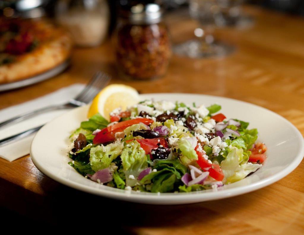 Zeek the Greek Salad · Romaine, green pepper, red onion, tomato, kalamata olive, feta and Greek dressing.