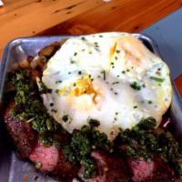 Steakin' Me Creggsy · 8 oz. flat-iron steak with chimichurri sauce, two eggs (your way), and potato and bell-peppe...