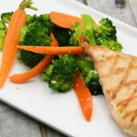 Kid's Grilled Chicken Breast · Served with veggies.