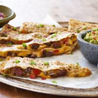 Steak Quesadilla · Filled with seasoned grilled steak, fresh pico de gallo, and cheddar and jack cheeses. Serve...