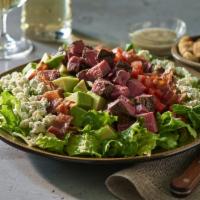 Steakhouse Cobb Salad  · Crisp chilled greens tossed with our house vinaigrette and layered with fresh avocado, tomat...
