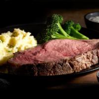 USDA Choice Prime Rib  · Seasoned with our Black Angus dry rub, seared and roasted to perfection. Served to order wit...