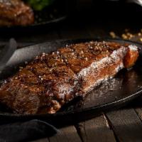 New York Strip Center Cut · Hearty and robust, a perfect balance of flavor, texture and tenderness.
