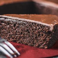 Chocolate Flourless Torte · A decadent flourless blend of four chocolates topped with a ganache. A timeless recipe that ...