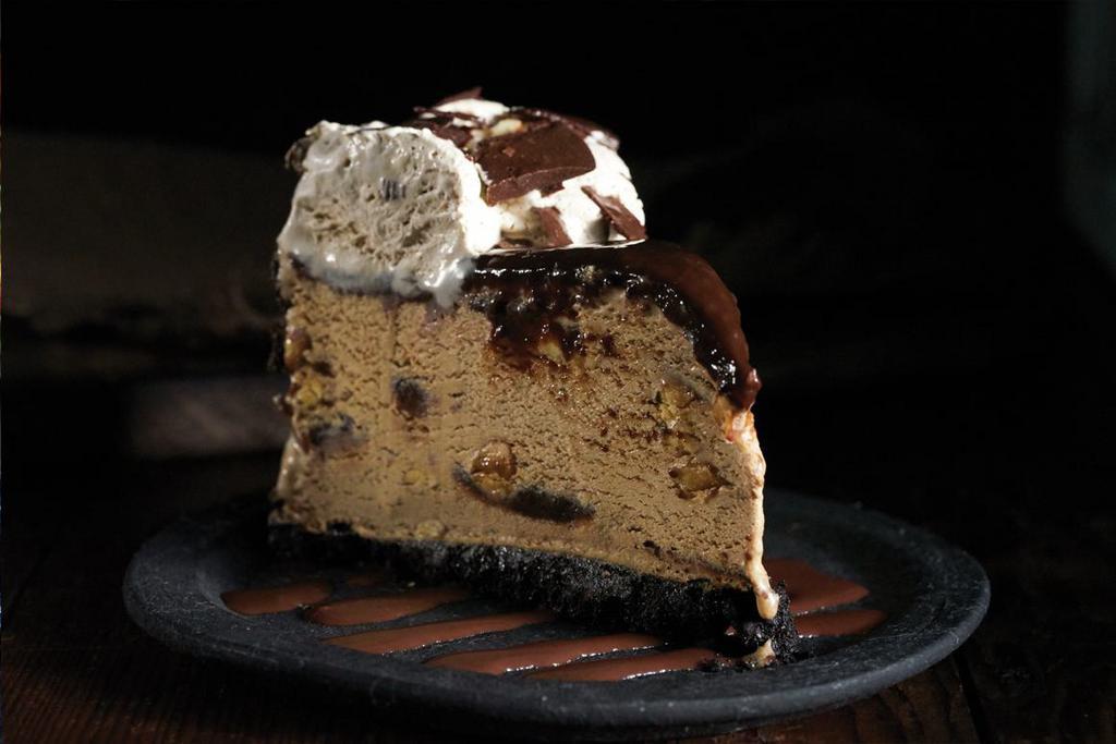 Sky-High Mud Pie · Fudge-swirled mocha almond ice cream in a chocolate cookie crumb crust. Contains nuts.