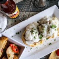 Biscuit and Gravy · Our signature biscuit topped with delicious gravy and veggie sausage crumbles, choice of ric...