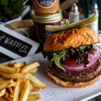 Gocha’s Impossible Burger · Delectable burger on a vegan bun, topped with tomato, mixed greens, onion, house aioli sauce...