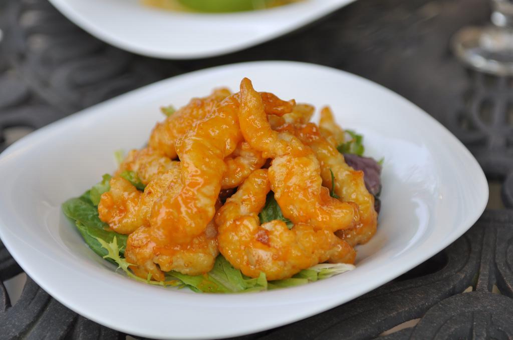 Spicy Rock Shrimp · With spicy creamy sauce. Spicy.