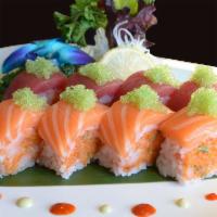 Wood Roll · Soy paper wrapped with spicy crunchy scallop, topped with tuna, salmon and wasabi tobiko.